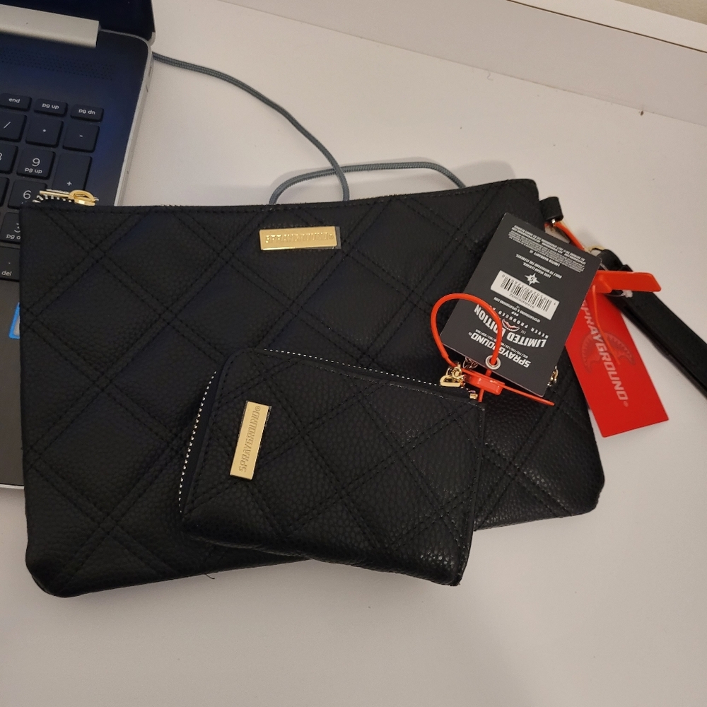 Limited Edition Sprayground clutch and zipper wallet in black. Sold as a set.